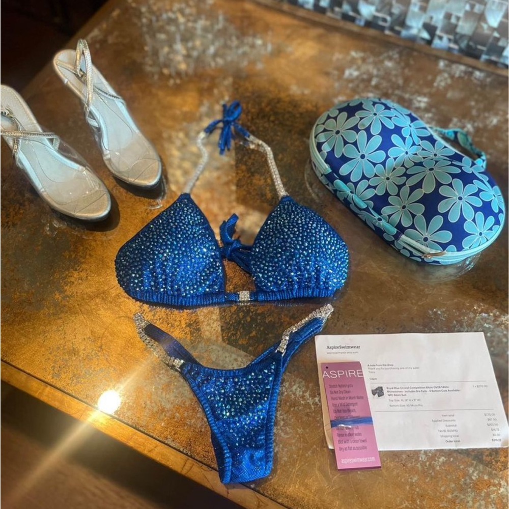 New royal blue crystal competition bikini set. Case & shoes included. Shoes sz 7